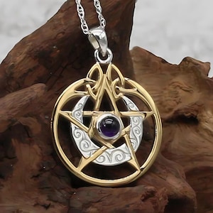 May include: A silver and gold pendant featuring a pentacle with a crescent moon and a purple amethyst gemstone in the center. The pendant is on a silver chain.