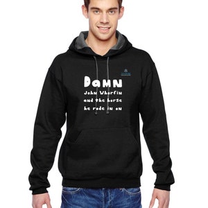May include: Black hoodie with a gray-lined hood and a front pocket. The hoodie features the text "Damn John Whorfin and the horse he rode in on" in white, with a small logo on the right side.