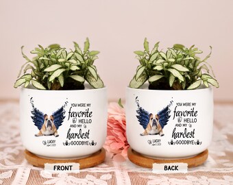 May include: White ceramic planter with a bulldog design and the text "You were my favorite hello and my hardest goodbye." The planter includes a wooden coaster and a green plant. The front of the planter says "FRONT" and the back says "BACK".