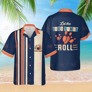 May include: Navy blue bowling shirt with orange and white vertical stripes. The shirt features a bowling pin graphic and the text "Let the Good Times Roll". The shirt has an orange collar and sleeve trim.