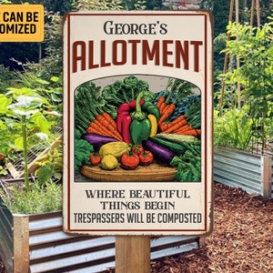 May include: A rectangular metal sign with the text "GEORGE'S ALLOTMENT" and a colorful illustration of vegetables. The sign also includes the text "WHERE BEAUTIFUL THINGS BEGIN TRESPASSERS WILL BE COMPOSTED."