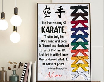May include: A framed poster with the text "The True Meaning of Karate" and a quote by Gichin Funakoshi. The poster features a marble-like background and a series of karate belt colors. The bottom of the poster says "Name can be customized".