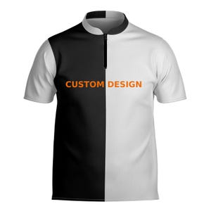 May include: A short-sleeved polo shirt with a half-and-half design, split vertically. One side is black, the other white. The shirt has a mandarin collar, a black zipper, and the words "CUSTOM DESIGN" in orange.