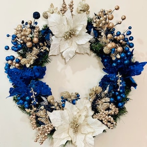 Stunning Pre-lit Blue and White Poinsettia Wreath