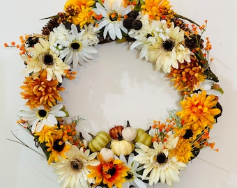 Een bloemen- en pompoenkrans voor de herfst: pompoenpatchkrans