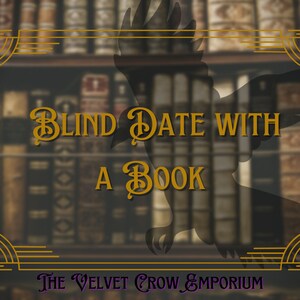 May include: A gold-framed sign with the text "Blind Date With A Book" in a decorative font. The sign is set against a blurred background of bookshelves. The text "The Velvet Crow Emporium" is at the bottom of the sign.