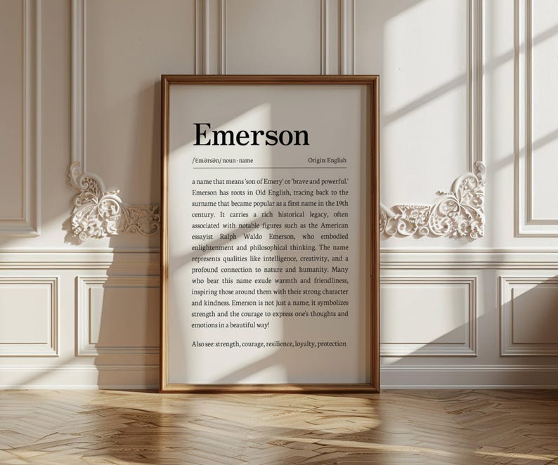 Peut inclure: Impression encadr&eacute;e avec le nom "Emerson" et sa d&eacute;finition, dans un cadre dor&eacute;. Le texte noir sur fond blanc est mis en valeur. L'impression est pr&eacute;sent&eacute;e sur un mur blanc avec des moulures d&eacute;coratives, pour une esth&eacute;tique classique.
