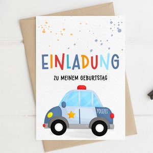 May include: A white card with colorful polka dots and the text "EINLADUNG" in rainbow colors. Below the text is "ZU MEINEM GEBURTSTAG". A cartoon blue and gray police car with a red light on top is at the bottom of the card.