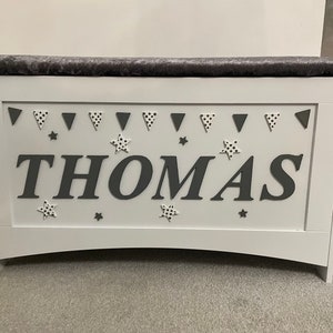 Personalised, bespoke, wooden toy box, storage, with safety hinge and padded lid plus engraved message under lid.