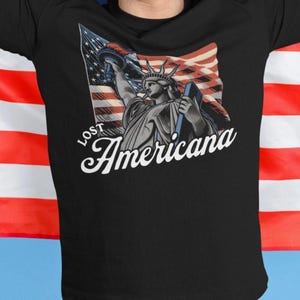 Lost Americana T-Shirt, Vintage Distressed Statue of Liberty American Flag Tee, Retro Patriotic Graphic Shirt, USA Symbolism Shirt, MGK Tee