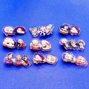 May include: A set of 10 colorful anime character pins. The pins are made of clear plastic and feature various characters from different anime series. The pins are perfect for adding a touch of anime style to your clothing, bags, or other accessories.
