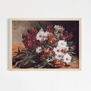 This vintage floral artwork features earthy reds, warm oranges and white colors. This vintage art piece would go perfect on any warm earthy colored walls!