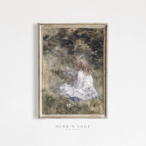 May include: A vintage painting of a young girl in a white dress sitting in a field of wildflowers. The girl is holding a bouquet of flowers in her hands. The painting is framed in a light wood frame.