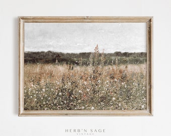 May include: A vintage framed print of a field of wildflowers in shades of green, brown, and white. The print has a rustic, faded look and features a distant line of trees in the background.