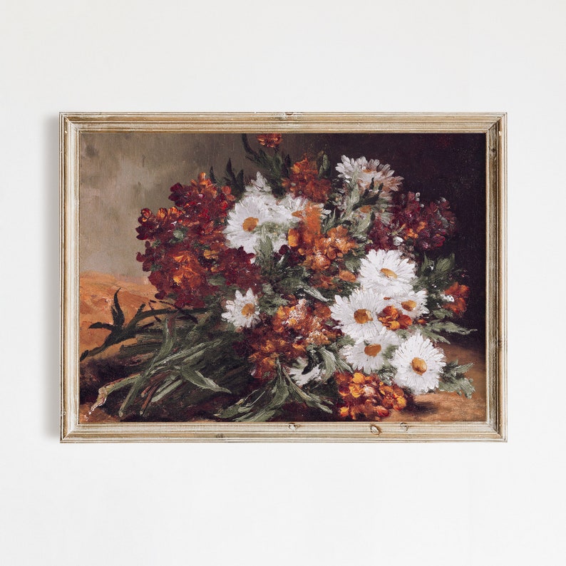 This vintage floral artwork features earthy reds, warm oranges and white colors. This vintage art piece would go perfect on any warm earthy colored walls!