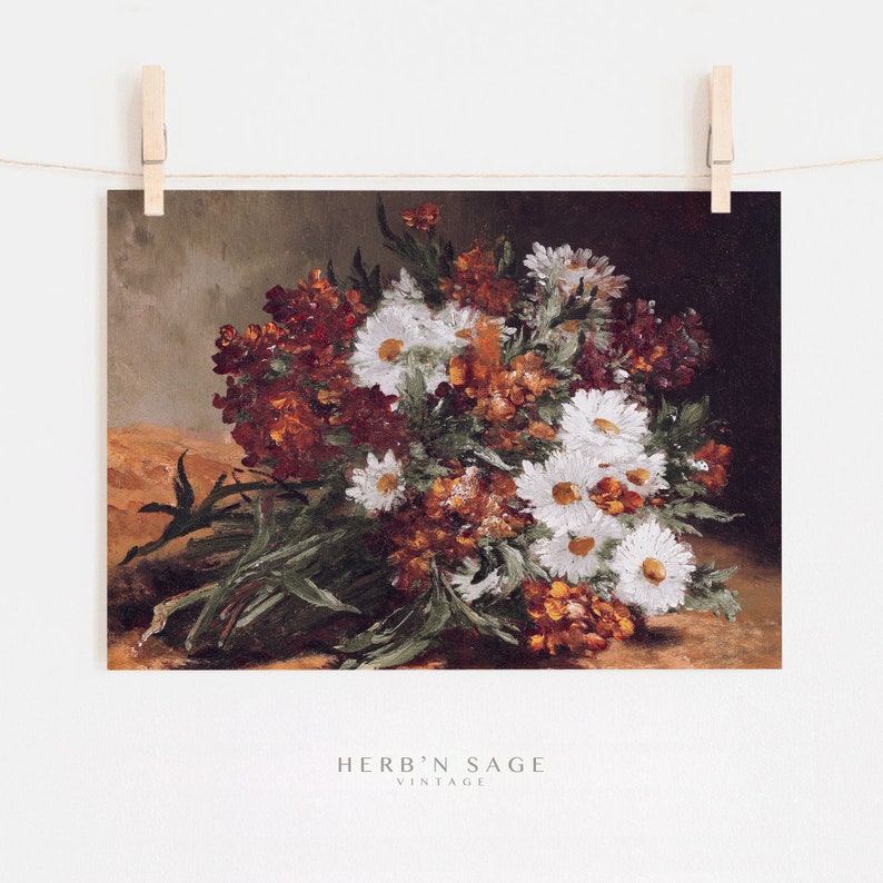 This vintage floral artwork features earthy reds, warm oranges and white colors. This vintage art piece would go perfect on any warm earthy colored walls!