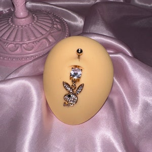 Golden Playbunny Bauchnabelpiercing Bild 1