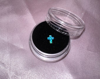 Opal cross dental gemstone