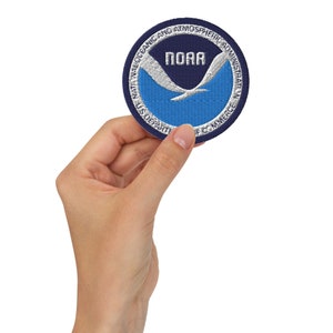 Haftowana naszywka z informacją o pogodzie NOAA