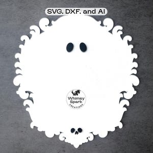 May include: A white, ornate, circular design with black oval eyes and a small skull at the bottom. The text "SVG, DXF, and AI" is at the top. The design includes the text "Whimsy Spark Creations".