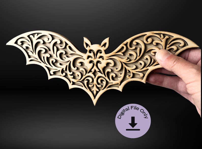 May include: A wooden bat silhouette with intricate cut-out designs. The bat is made of light brown wood and has a delicate, ornate pattern.