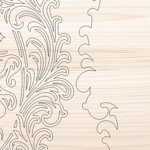 May include: Laser-cut wooden design featuring intricate floral and scrollwork patterns. The design includes stars and a decorative border, set against a light wood grain background. This craft item is suitable for various DIY projects.