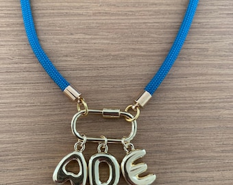 Personalized Teal Paracord Necklace with gold bubble initials. Spring fashion accessory, thoughtful gift