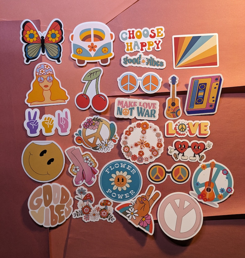 May include: A collection of colorful, retro-style stickers with a 1960s and 1970s theme. Designs include a butterfly, a VW bus, peace signs, a smiley face, a guitar, and the phrases "Choose Happy," "Good Vibes," and "Make Love Not War."