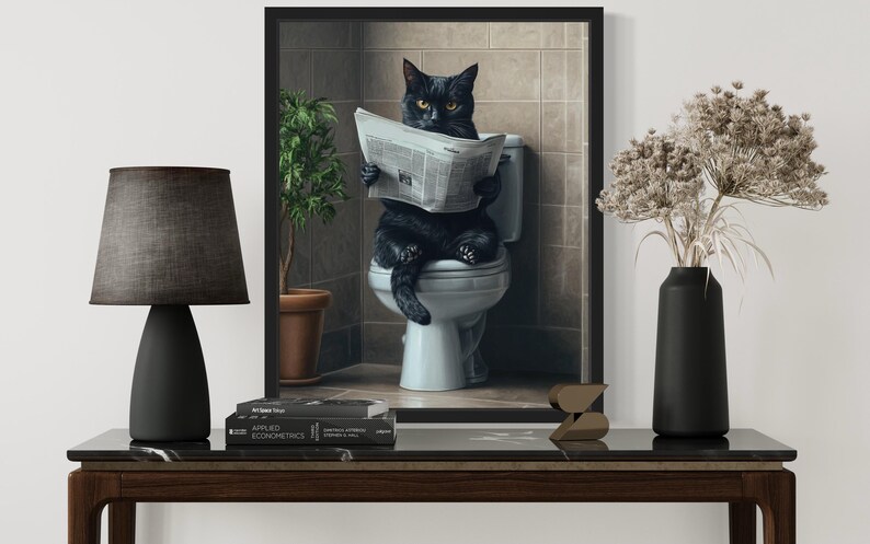 May include: A black cat sits on a white toilet, reading a newspaper. The cat is wearing a serious expression and has its paws resting on the newspaper. The toilet is in a bathroom with tiled walls and a plant in a pot.