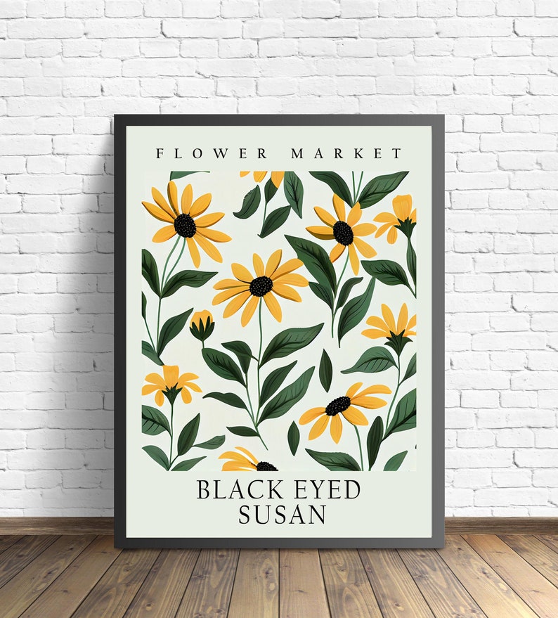 May include: A black framed poster with a white background and a pattern of yellow black-eyed Susan flowers with green leaves. The poster has the text "FLOWER MARKET" at the top and "BLACK EYED SUSAN" at the bottom.