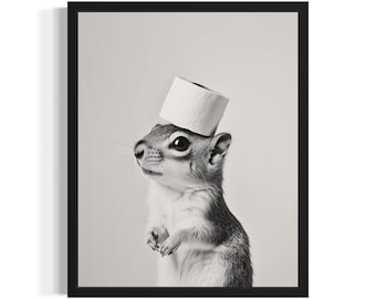 May include: A black and white photograph of a squirrel wearing a toilet roll as a hat.