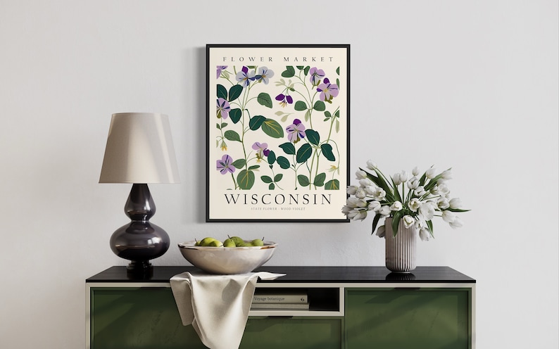 May include: A framed botanical print featuring purple and green flowers with the text "FLOWER MARKET WISCONSIN STATE FLOWER: WOOD SORREL"
