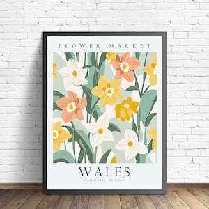 May include: A poster with a floral design featuring yellow, white, and orange daffodils. The poster has the text "FLOWER MARKET" at the top and "WALES" at the bottom with the text "STATE FLOWER - DAFFODILS" below.