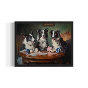 May include: Three black and white border collies are sitting at a table playing cards. The dogs are wearing collars and are holding cards in their paws. The table is wooden and has a blue and white cup on it.