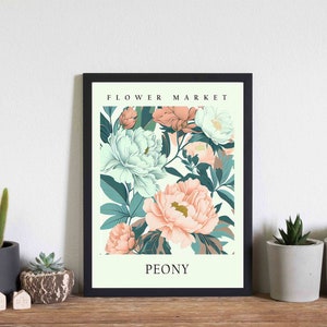 Może przedstawiać: Wydruk w ramie z kwiatowym wzorem przedstawiającym r&oacute;żowe i białe piwonie. Wydruk zawiera tekst "FLOWER MARKET" i "PEONY" u g&oacute;ry i na dole.