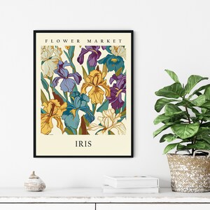 May include: A vintage-style poster with the text "FLOWER MARKET" and "IRIS" in black lettering. The poster features a colorful illustration of a bouquet of iris flowers in shades of yellow, purple, blue, and green.
