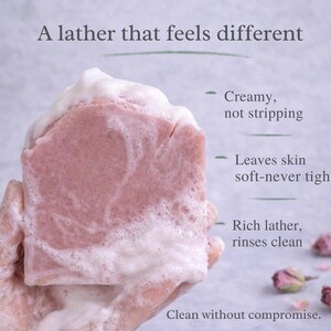 Tallow bar soap bundle by EmberLeaf Crafts. The image shows a variety of colorful, natural soaps—Rose Flower, Citrus Grove, and Oak & Elderberry—neatly laid out on a clean marble surface with scattered white flower petals.