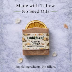 Tallow bar soap bundle by EmberLeaf Crafts. The image shows a variety of colorful, natural soaps—Rose Flower, Citrus Grove, and Oak & Elderberry—neatly laid out on a clean marble surface with scattered white flower petals.