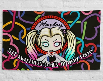 May include: A black flag with a colourful design featuring a cartoon character with blonde hair and blue eyes. The character is wearing a red and white jester's hat and has a pink and blue heart-shaped design on her chest. The text "Harley" is written in a white font above the character's head. The text "Self Awareness Comes In Many Forms" is written in a white font below the character. The background of the flag is black with colourful hearts and circles.