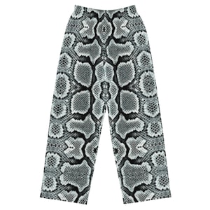 May include: Grey and black patterned trousers with a snake skin design.
