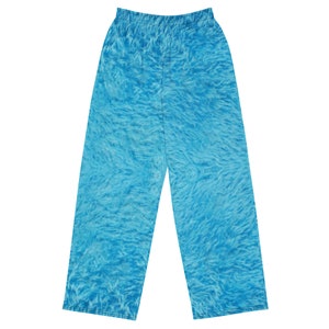 May include: A pair of blue pajama pants with a fuzzy, water-like pattern.
