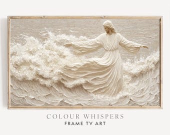 May include: A white figure in a flowing robe stands on a textured, white wave. The figure is facing left and has long hair. The background is a light beige color. The image is framed in a light wood frame. The text "COLOUR WHISPERS FRAME TV ART" is below the image.