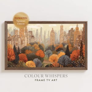 May include: A framed digital art print for a television featuring a city skyline overlooking a park with autumn foliage in shades of orange, yellow, and grey. A circular gold emblem in the top left corner reads Thanksgiving Signature Edition.