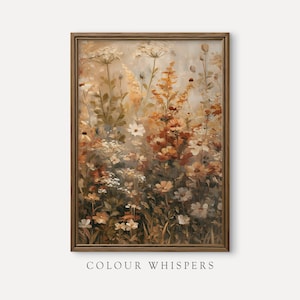 May include: A framed vertical wall art print featuring an oil painting of a wildflower meadow in shades of beige, cream, rust, and brown. The artwork depicts various floral stems and blossoms with visible brushstrokes. The text COLOUR WHISPERS appears below.