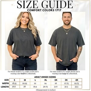 May include: Size guide for Comfort Colors 1717 t-shirts. The image shows a woman and a man modeling the shirts. The size chart includes measurements in inches for adult unisex sizing, ranging from S to 4X. The female model is wearing a size Small, and the male model is wearing a size Large.