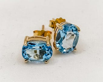 9ct Gold Blue Topaz Earrings, Oval Gemstone Studs, 8mm x 6mm Topaz, December Birthstone Jewellery