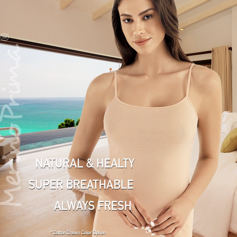 May include: A light pink sleeveless undershirt with the text "NATURAL & HEALTHY", "SUPER BREATHABLE", and "ALWAYS FRESH".