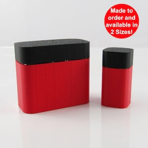 May include: Two red storage boxes with black lids. The larger box is about 4 inches tall and the smaller box is about 2 inches tall. Made to order and available in 2 sizes.