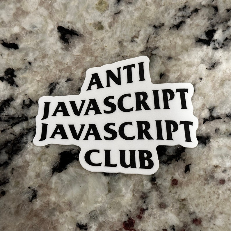 May include: White sticker with black text that reads "ANTI JAVASCRIPT JAVASCRIPT CLUB".