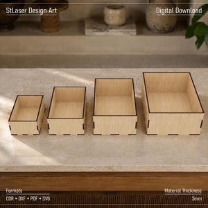 May include: Four rectangular light-colored wooden boxes of varying sizes arranged in a row. Each box features dark edges and visible interlocking joints at the corners. The text StLaser Design Art, Digital Download, Formats CDR DXF PDF SVG, and Material Thickness 3mm are visible.